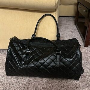 NEW NEVER USED Black travel quilted duffle bag
